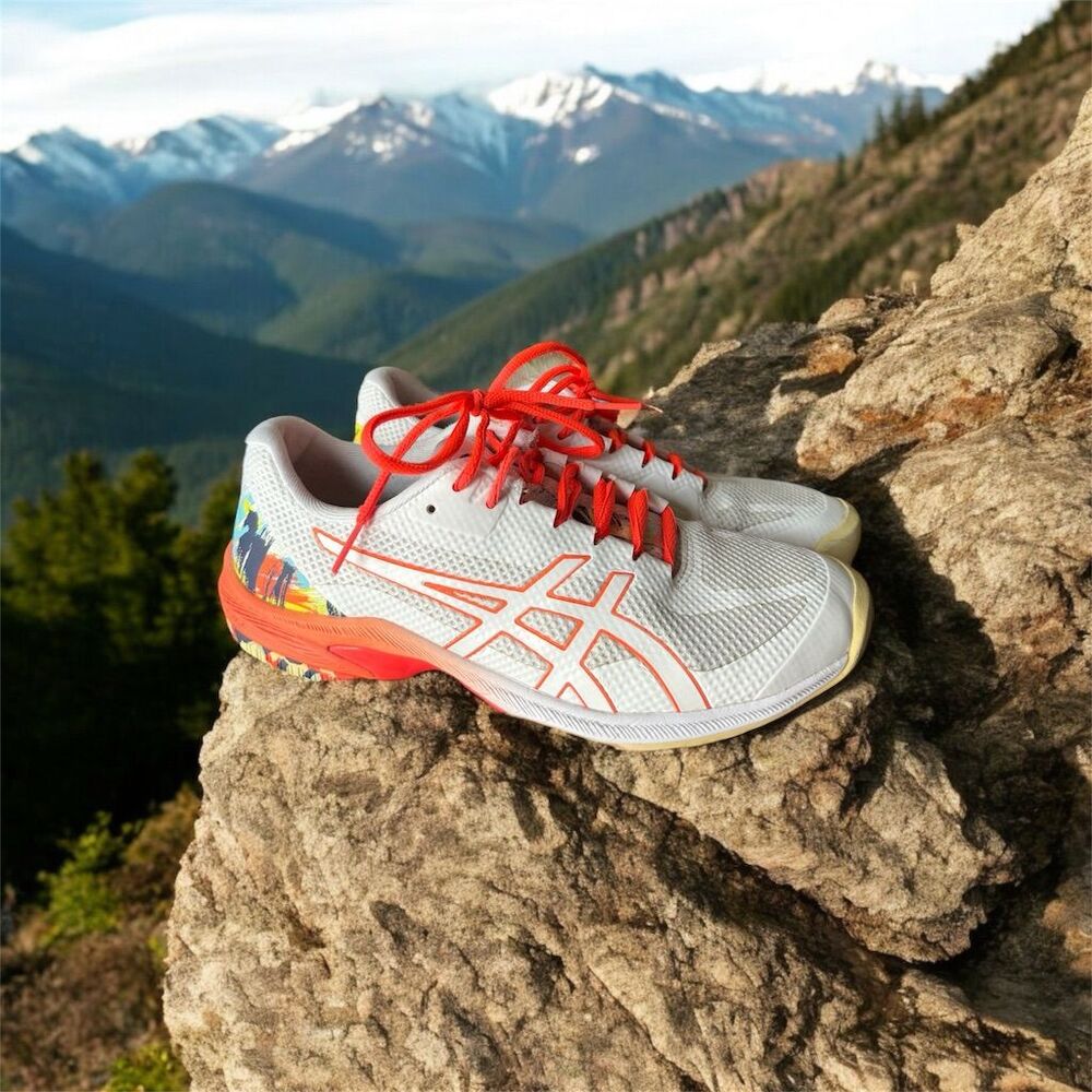 Asics Women's White Athletic Shoes with Orange Accents and Multicolor Heel